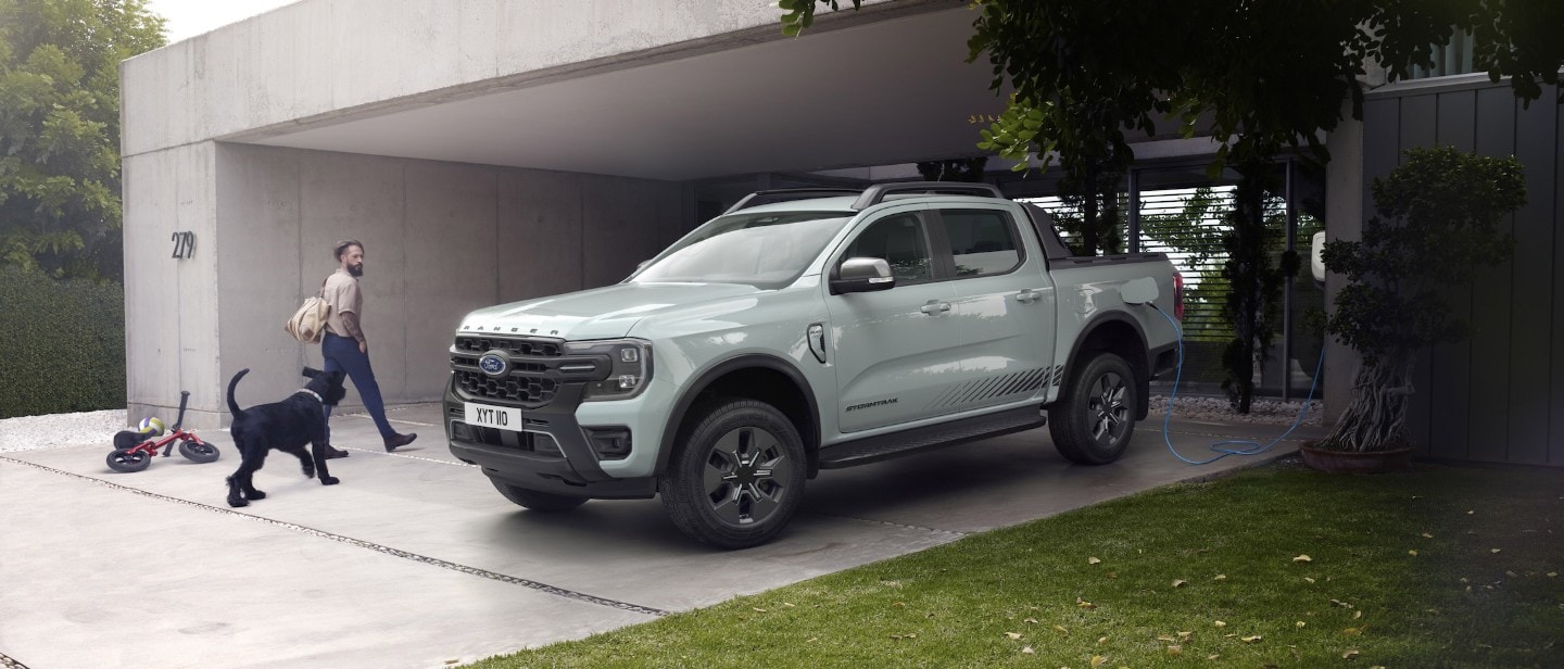 White All-New Ranger Plug-in Hybrid being charged