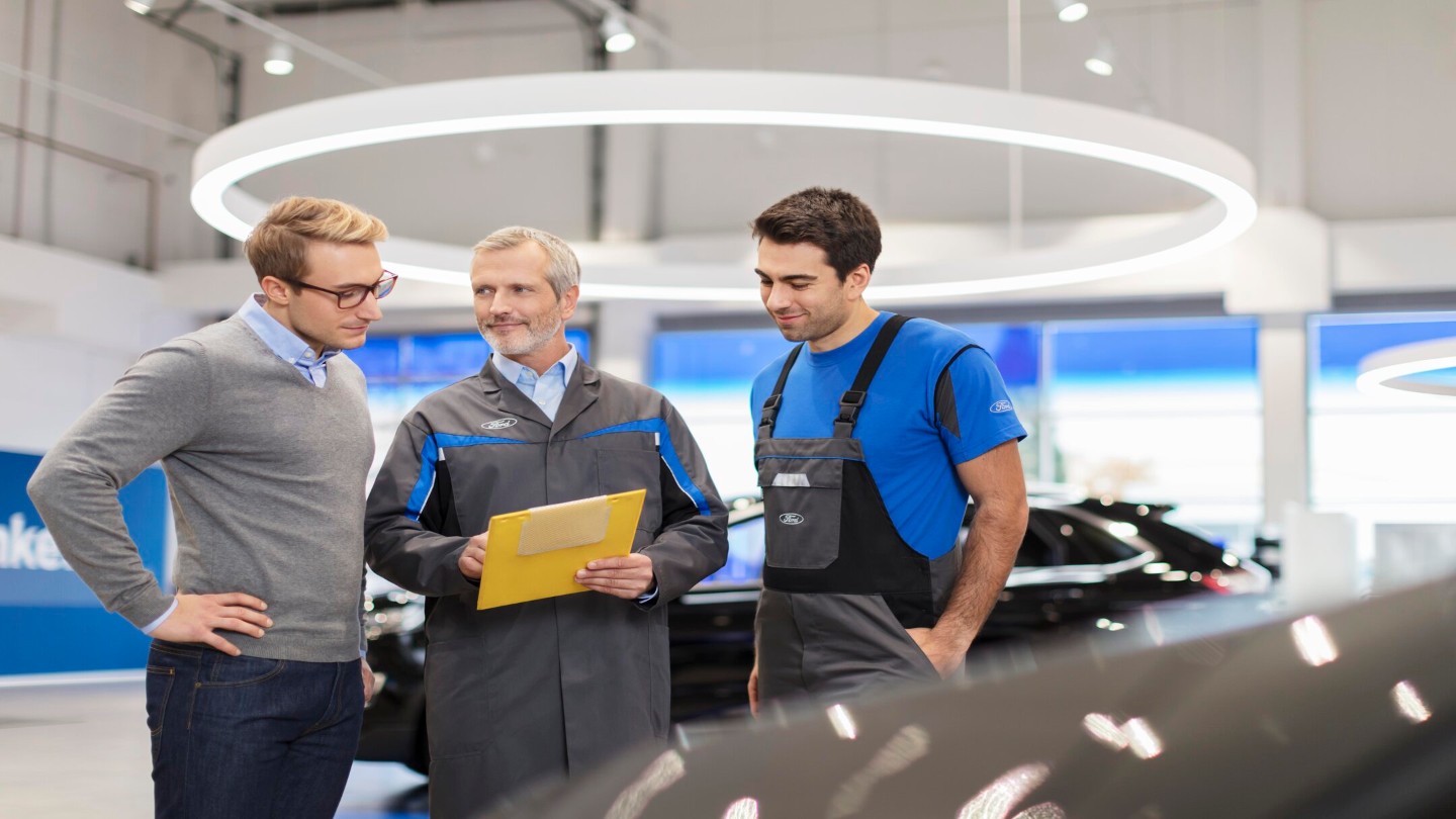 Group of Ford workers collaborating