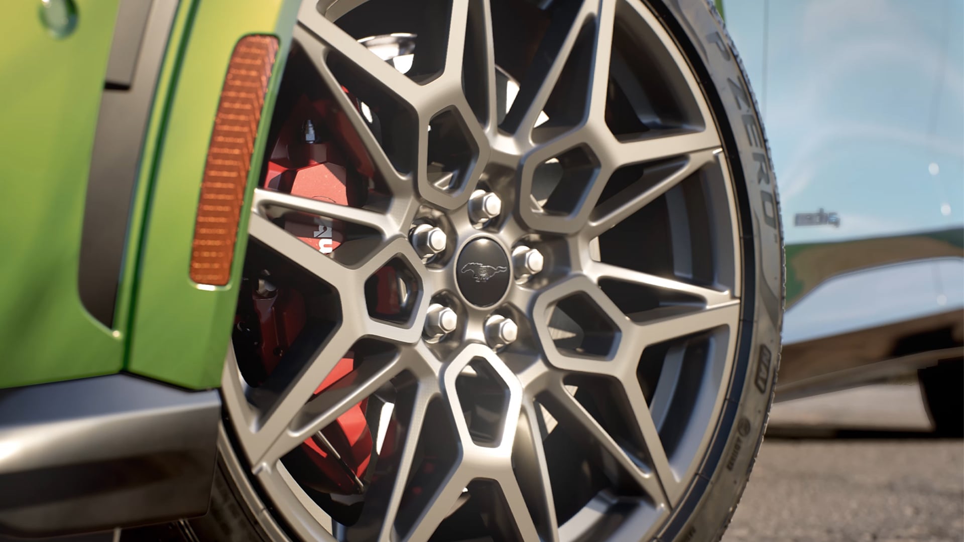  A close-up of the Ford Mustang Mach-E showing the 20" Cast Aluminium Carbonised Grey alloy wheels.
