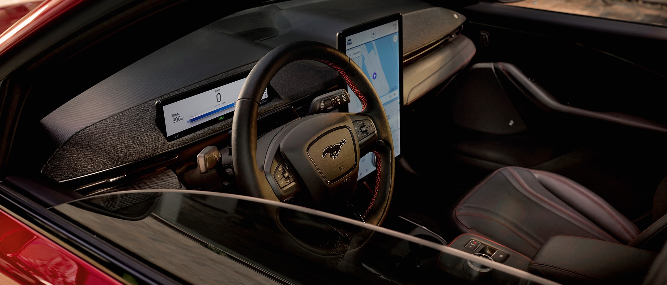 All-New Ford Mustang Mach-E interior with the steering wheel and Next Generation SYNC screen