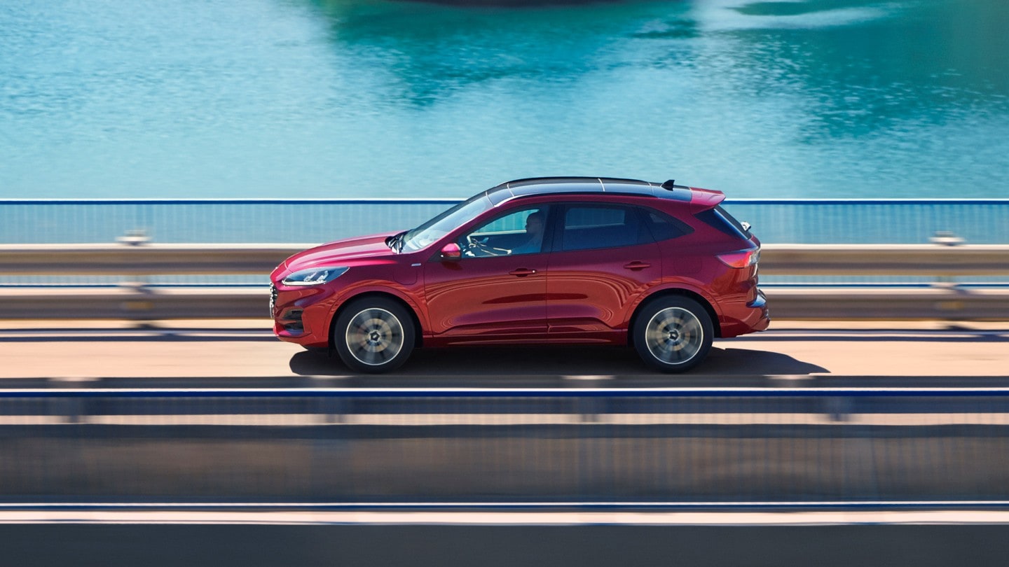 Red Ford Kuga on a bridge