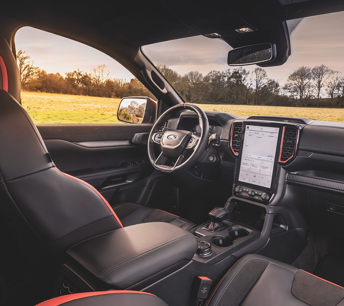 Ford Ranger Raptor interior with the steering wheel and centre console with touchscreen