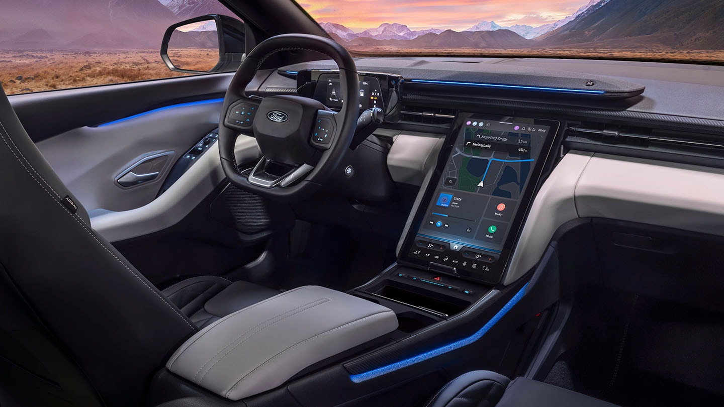 The interior of the All-Electric Ford Explorer® with blue ambient lighting.