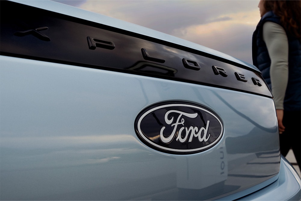 Ford Explorer Badge on a light-blue explorer