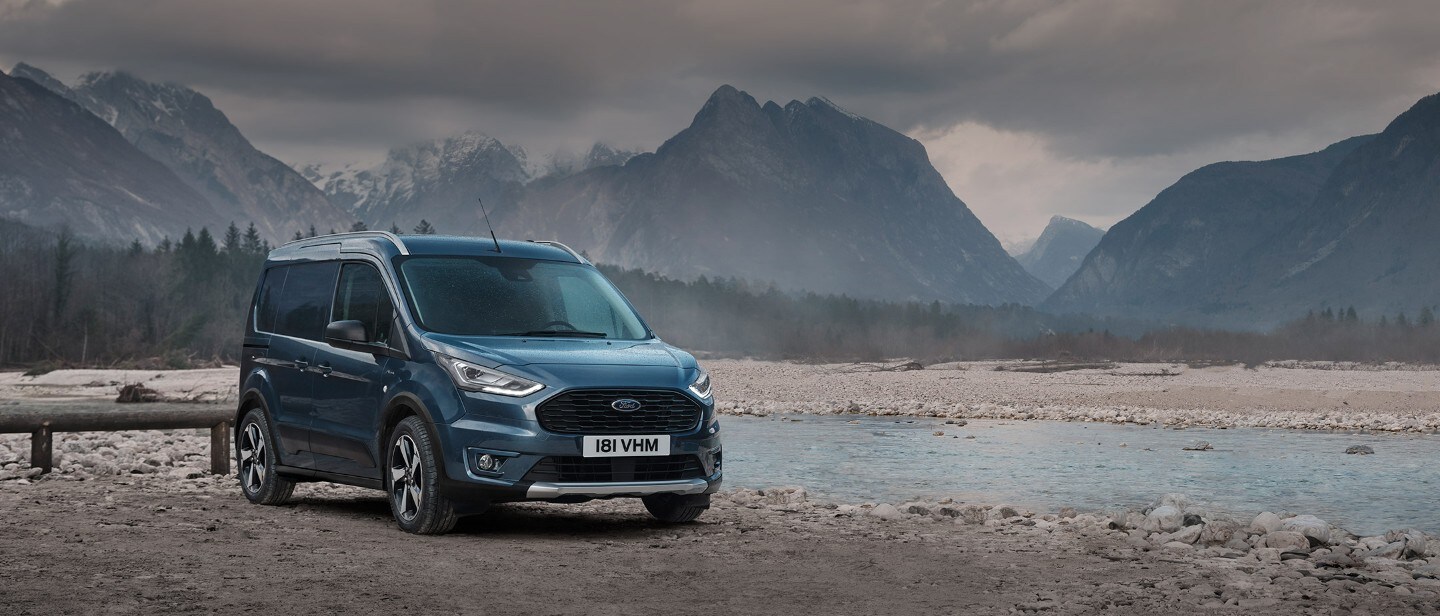 Blue Ford Transit Connect Active parked outside