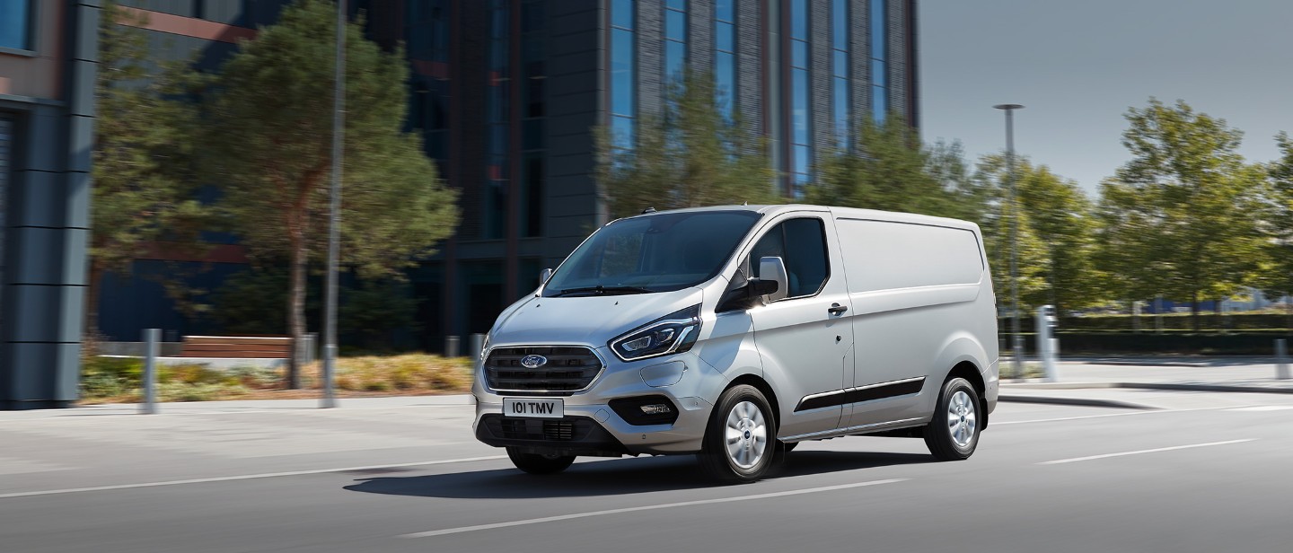 New Silver Ford Transit Custom driving