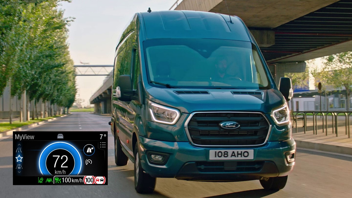 Ford Transit Van driving on motorway front view with EcoGuide dial in detail