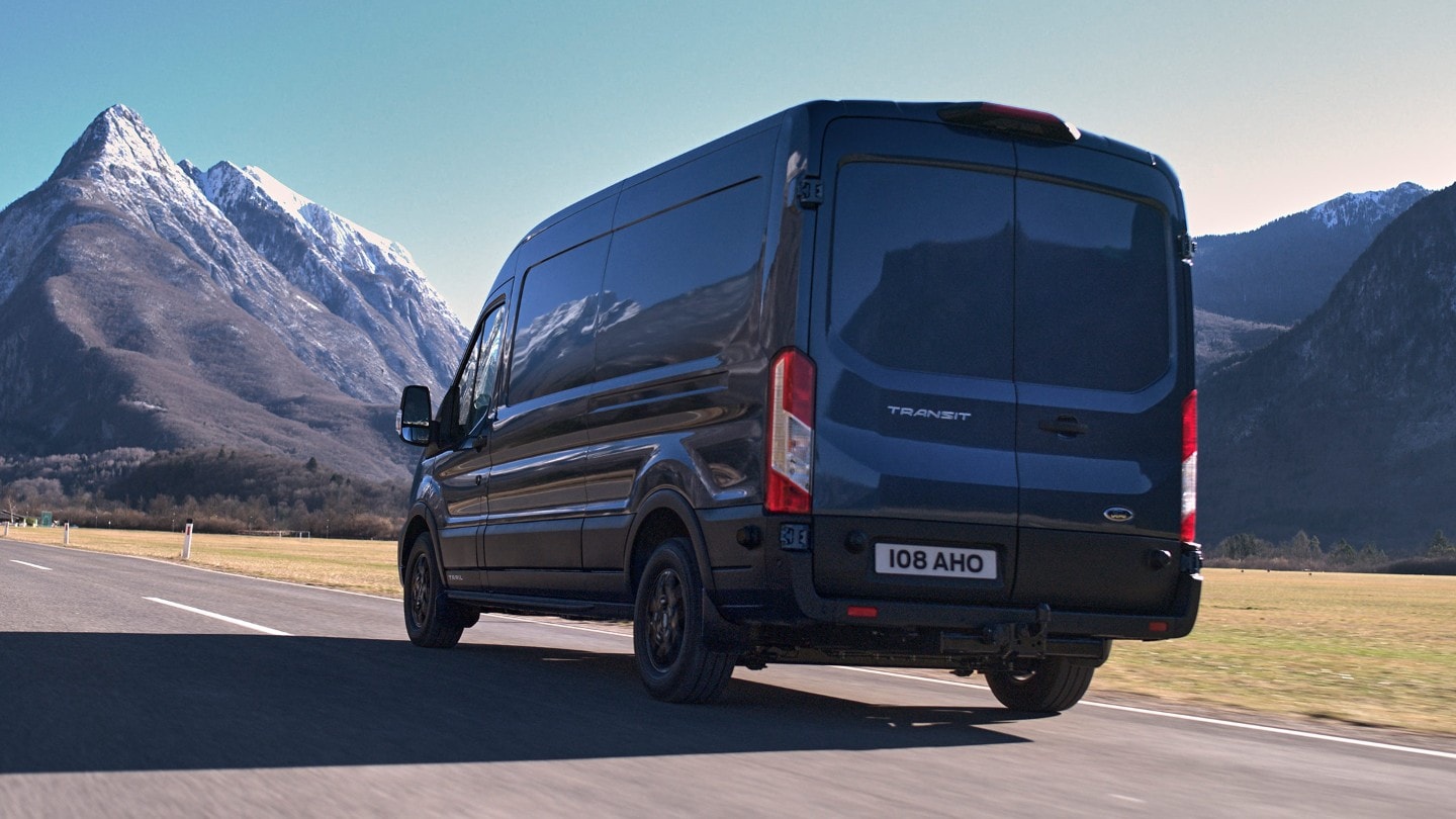 new Ford Transit Van Trail driving on mountain road