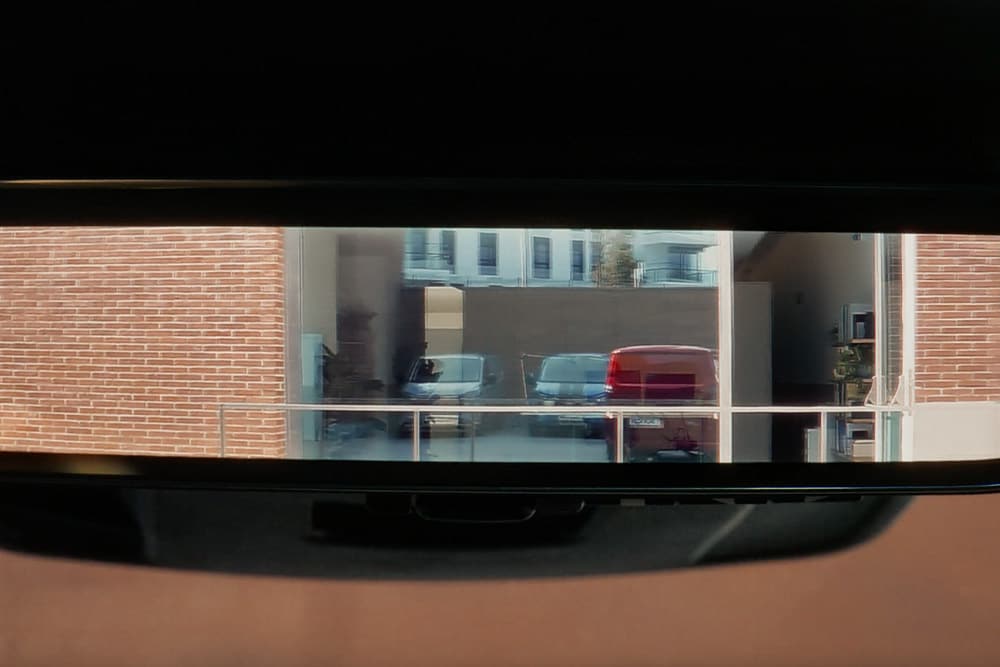 Rearview mirror inside a Ford E-Transit Custom electric van.