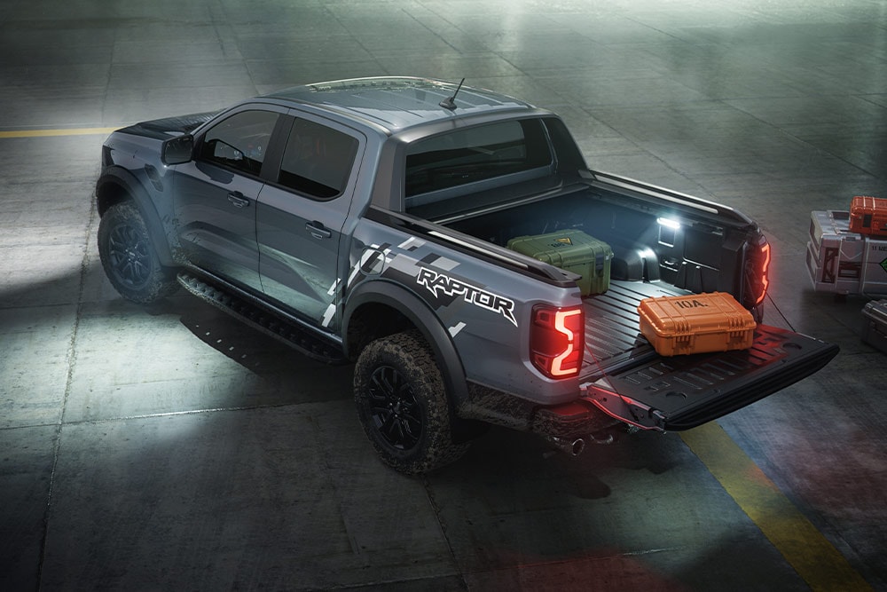 Back view of a Ford Ranger Raptor showcasing the vehicle's exterior zone lighting.