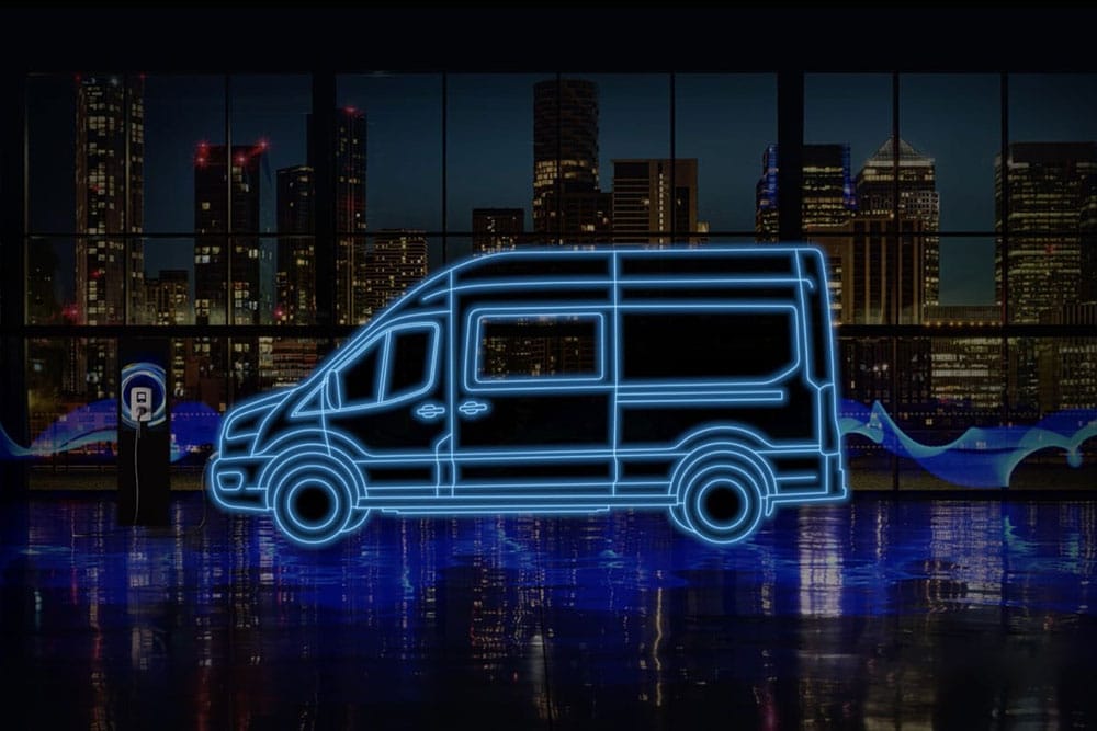 Neon blue outline of a Ford E-Transit Double Cab-in-Van and charging station against a city skyline.