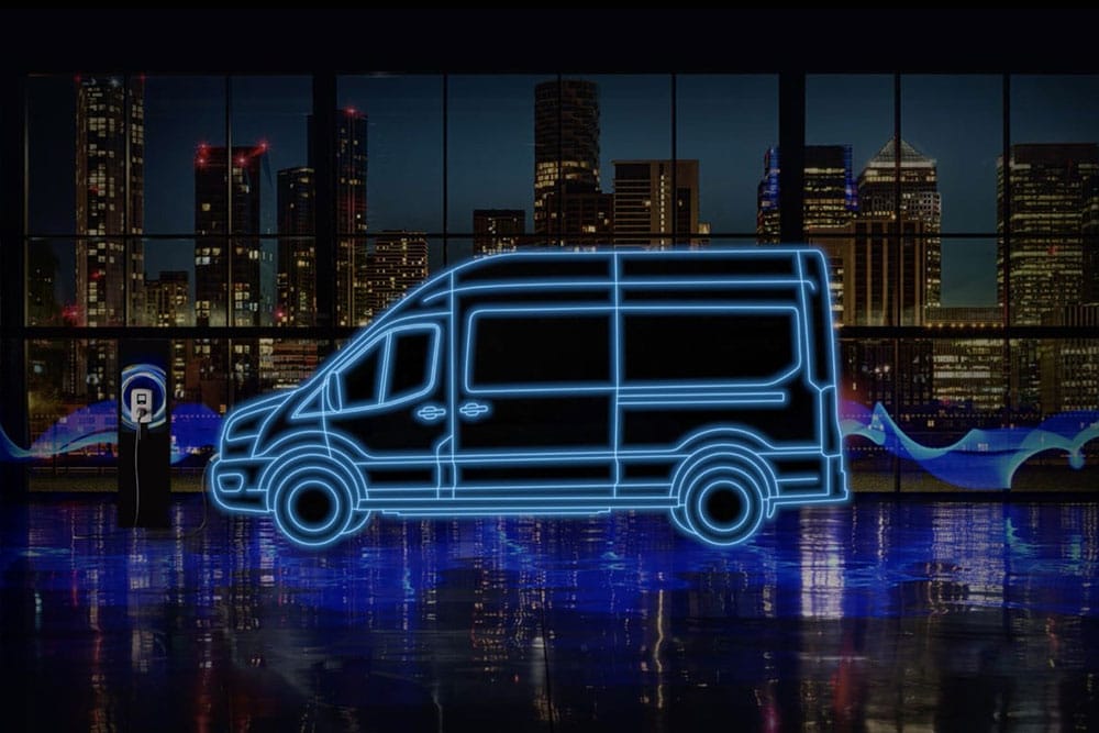 Neon blue outline of a Ford E-Transit electric van and charging station against a city skyline.