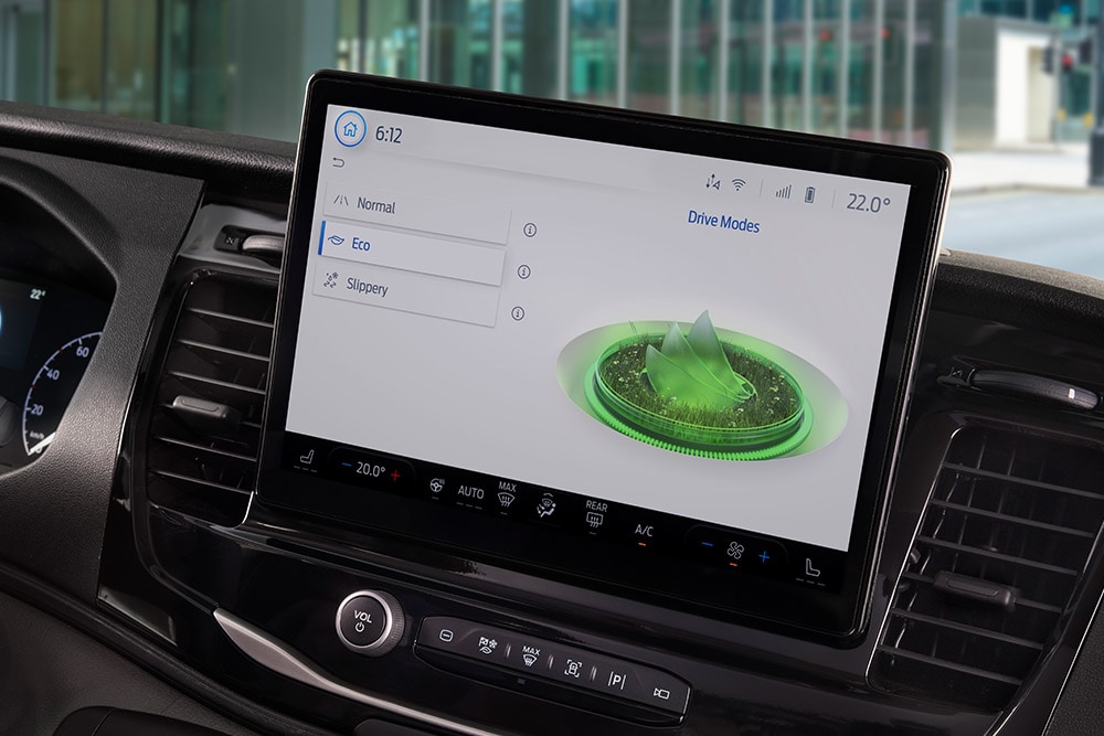 Dashboard of a Ford E-Transit electric van with a touchscreen displaying drive modes.