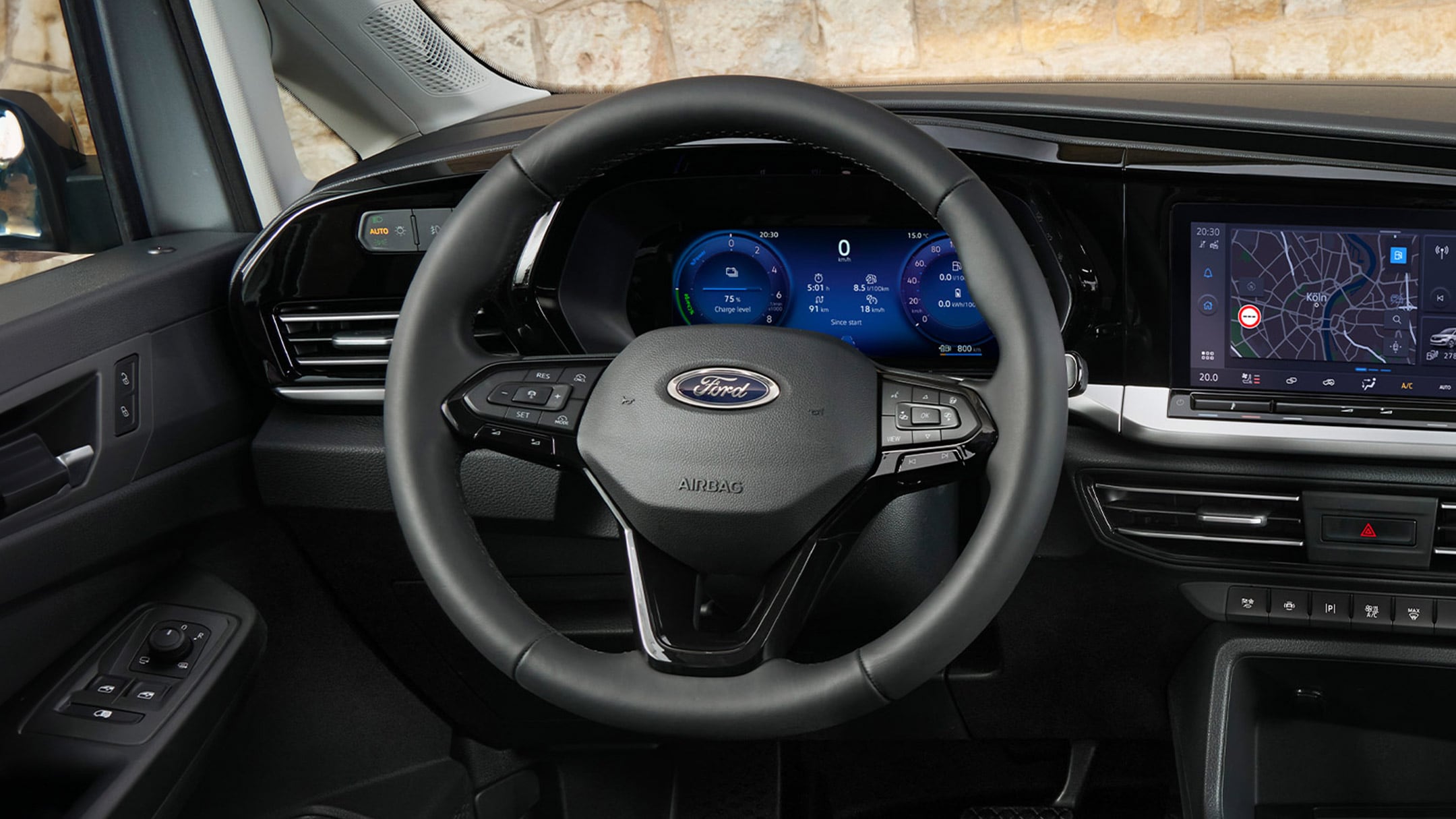 Driver’s view of All-New Ford Transit Connect, with heated steering wheel, digital instrument cluster and 10” touchscreen. 