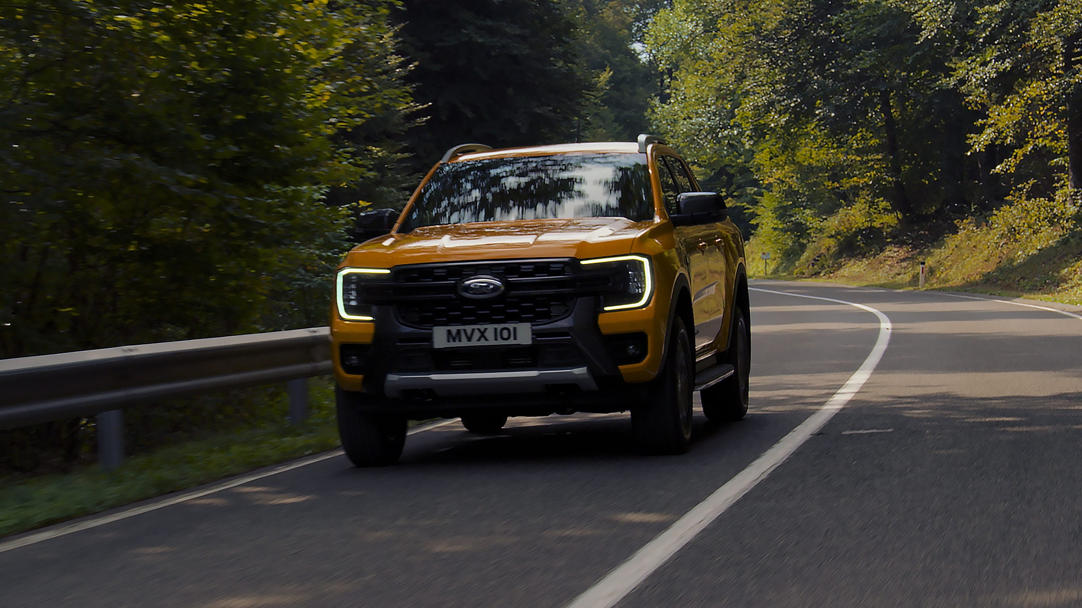 Ford Ranger driving along country road