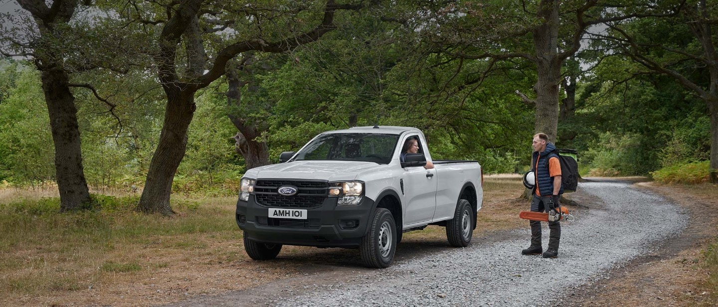 Ranger Regular Cab parked on gravel road 3/4 front view