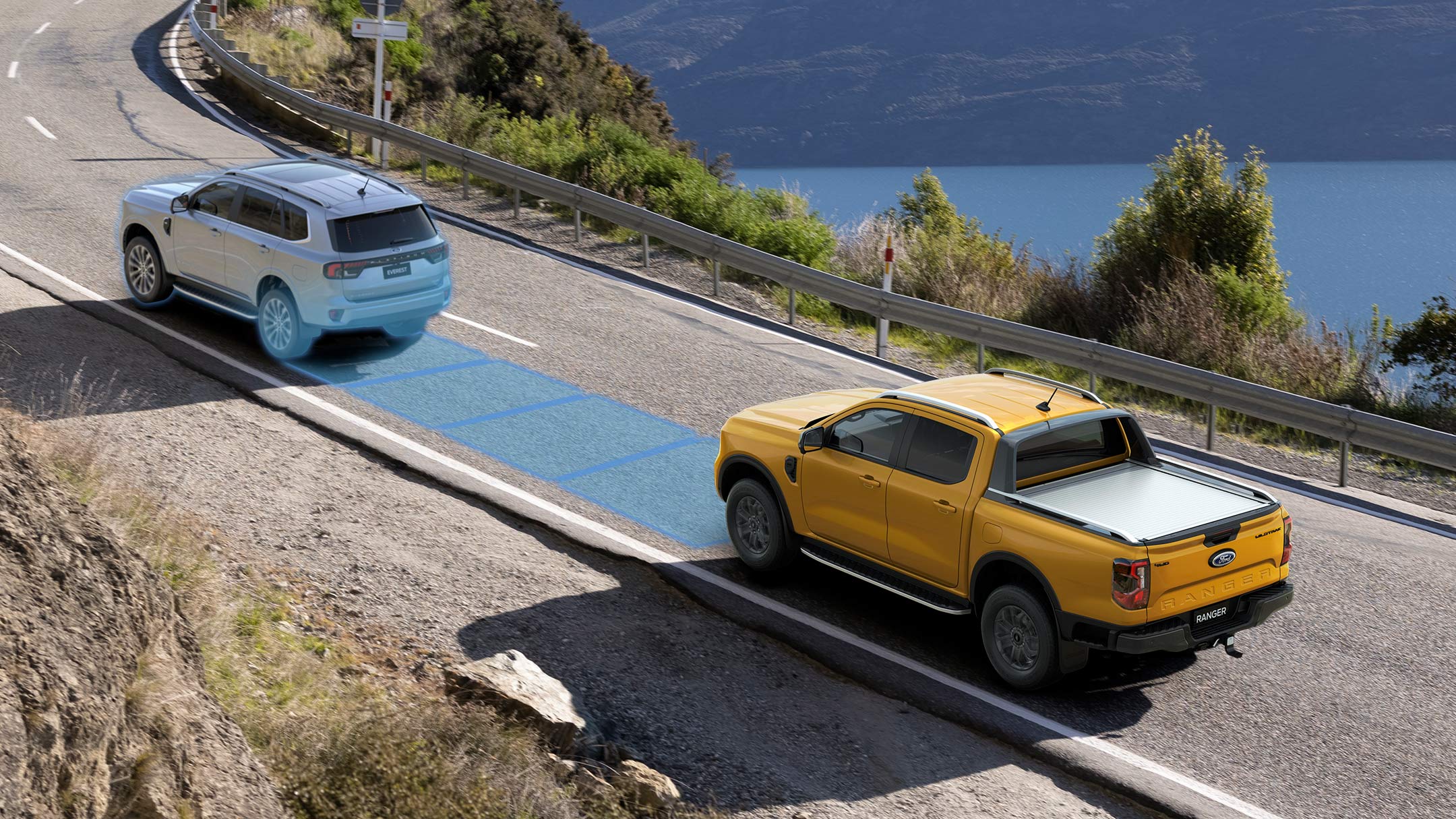 Ford Ranger on coastal road with Post Impact Braking graphic