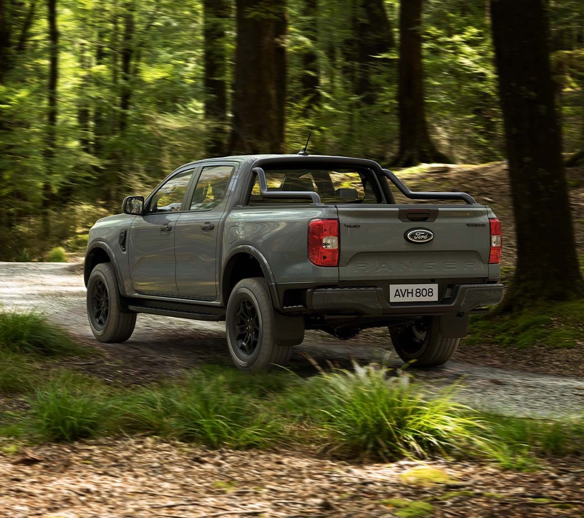 Ranger Tremor driving in forest rear view