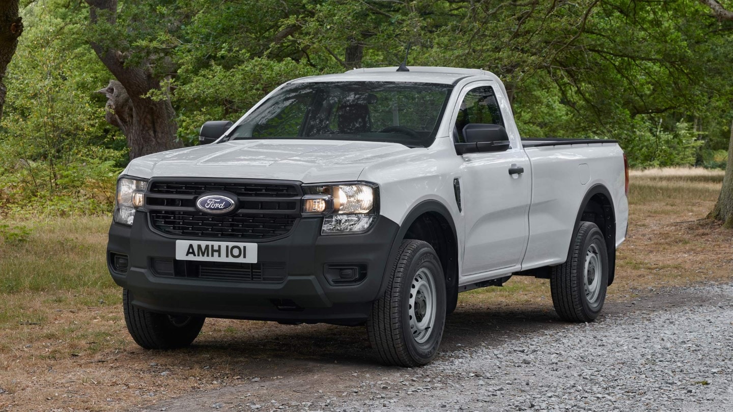 Ford Ranger 3/4 front view parked on gravel road