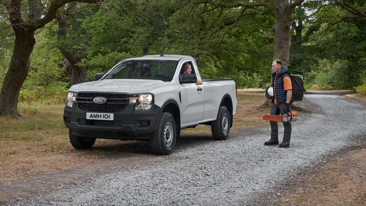 Ranger Raptor 3/4 front view on gravel road