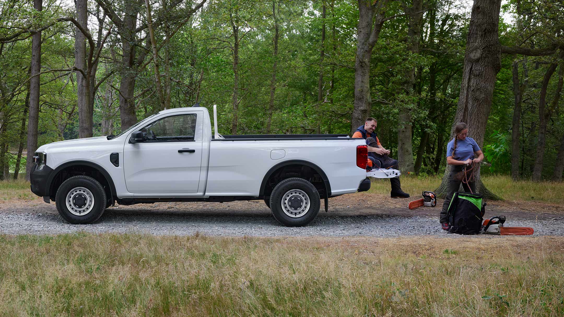 Ranger on gravel road side view