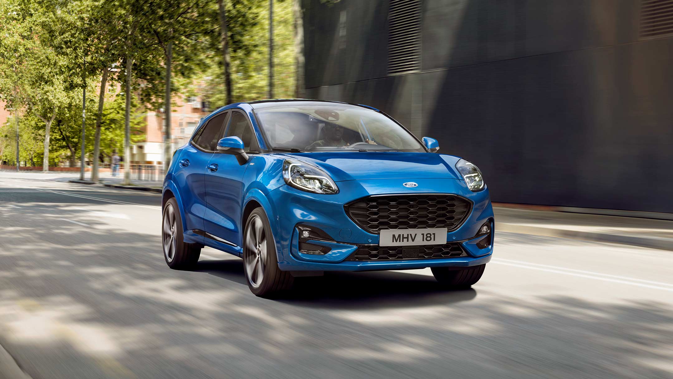 Ford Puma in Blue driving in the city