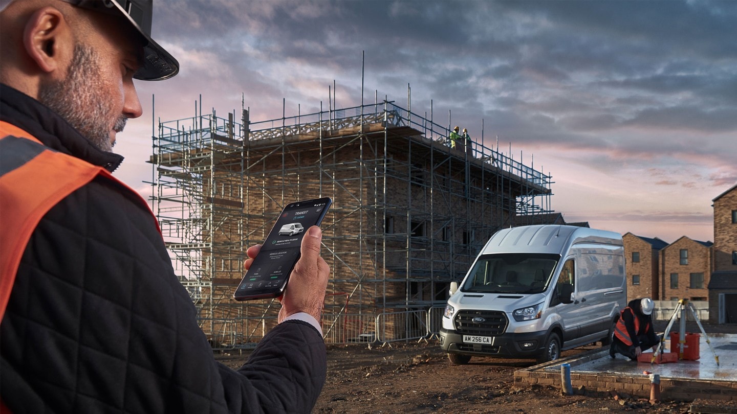 Man booking a van service on a smartphone