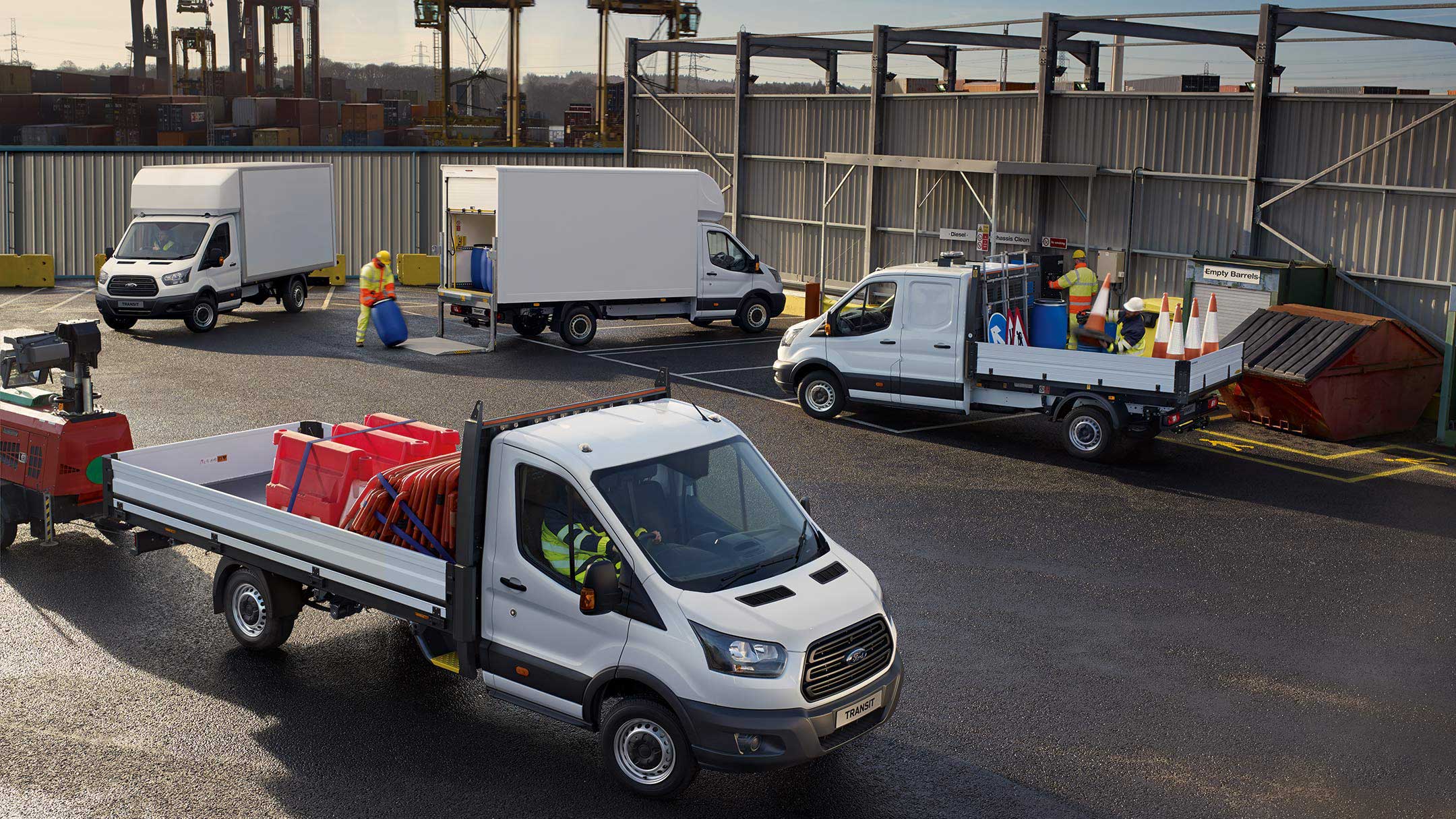 Transit Commercial vehicles range parked at a building sight